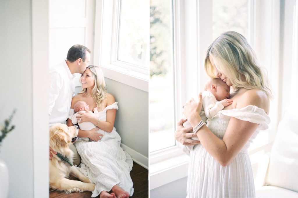 New mother and father cuddling newborn baby with dog in beautiful Franklin home with images taken by Franklin newborn photographer