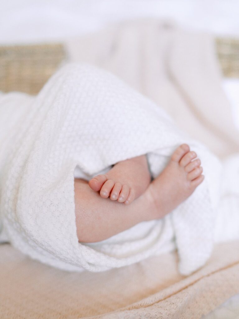 Detail photo of baby's toes taken by Courtney Houk Photography at a Nashville in-home newborn session