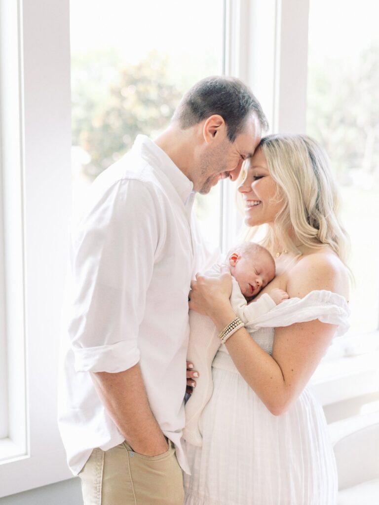 This dreamy window light was possible because mom listened to the tips from Courtney Houk on how to prepare for your nashville in-home newborn session