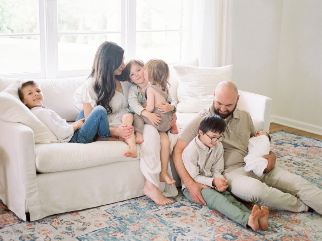 This mama took Nashville family photographer's advice with what to wear for family photos as she styled her family of seven in these newborn photos