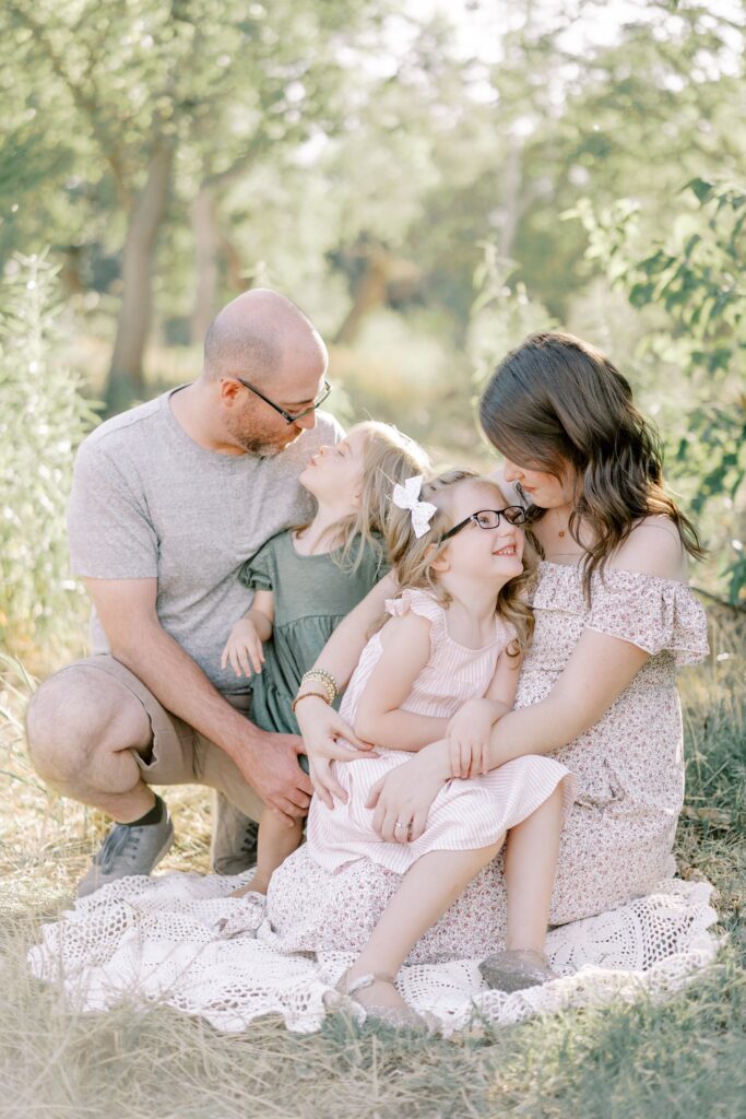 Nashville family photographer captures a photo of a family of photo with stunning coordinating outfits as they took her advice on what to wear for family photos