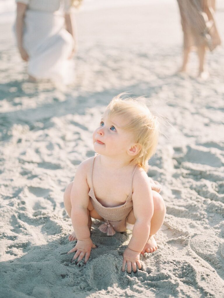 a baby in the sand